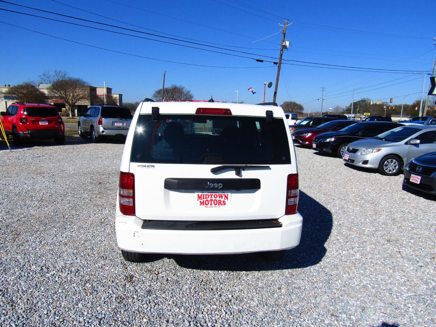 2010 WHITE Jeep Liberty Sport 2WD (1J4PP2GK3AW) with an 3.7L V6 SOHC 12V engine, Automatic transmission, located at 15016 S Hwy 231, Midland City, AL, 36350, (334) 983-3001, 31.306210, -85.495277 - Photo#6